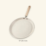 A 10-inch round non-stick frying pan with a speckled off-white interior and a light wood handle, shown on a light cream background with a size label below.