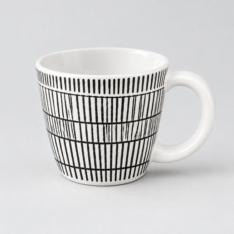 A white ceramic coffee mug with a black hand-drawn vertical stripe pattern, shown on a light gray background.