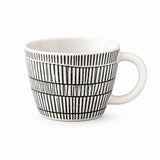 A white ceramic coffee mug with a black hand-drawn vertical stripe pattern, shown on a clean white background.