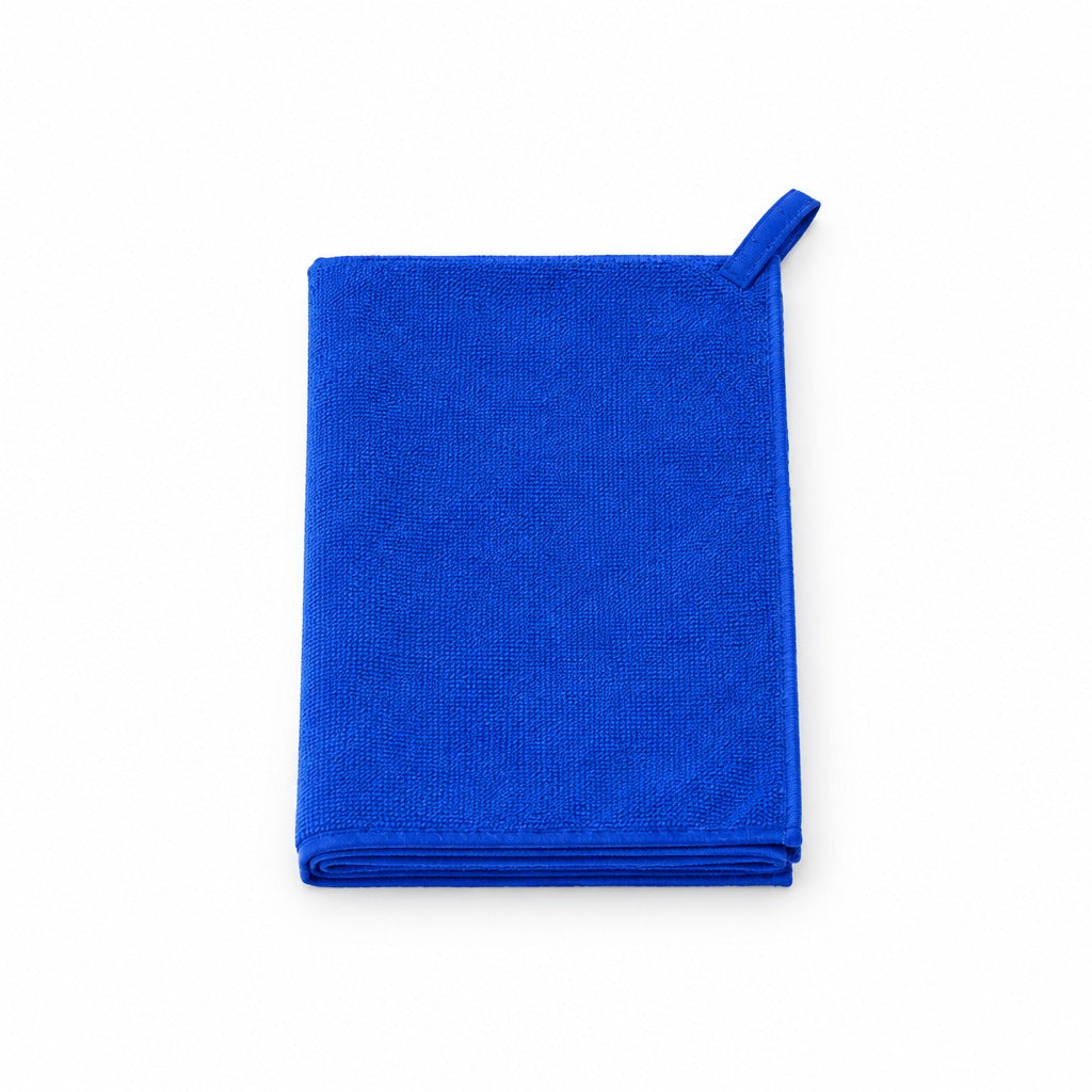 A folded royal blue microfiber cleaning cloth with a small matching loop handle, shown on a plain white background.