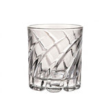 A clear cut-glass tumbler with a textured, faceted pattern, shown on a solid white background.