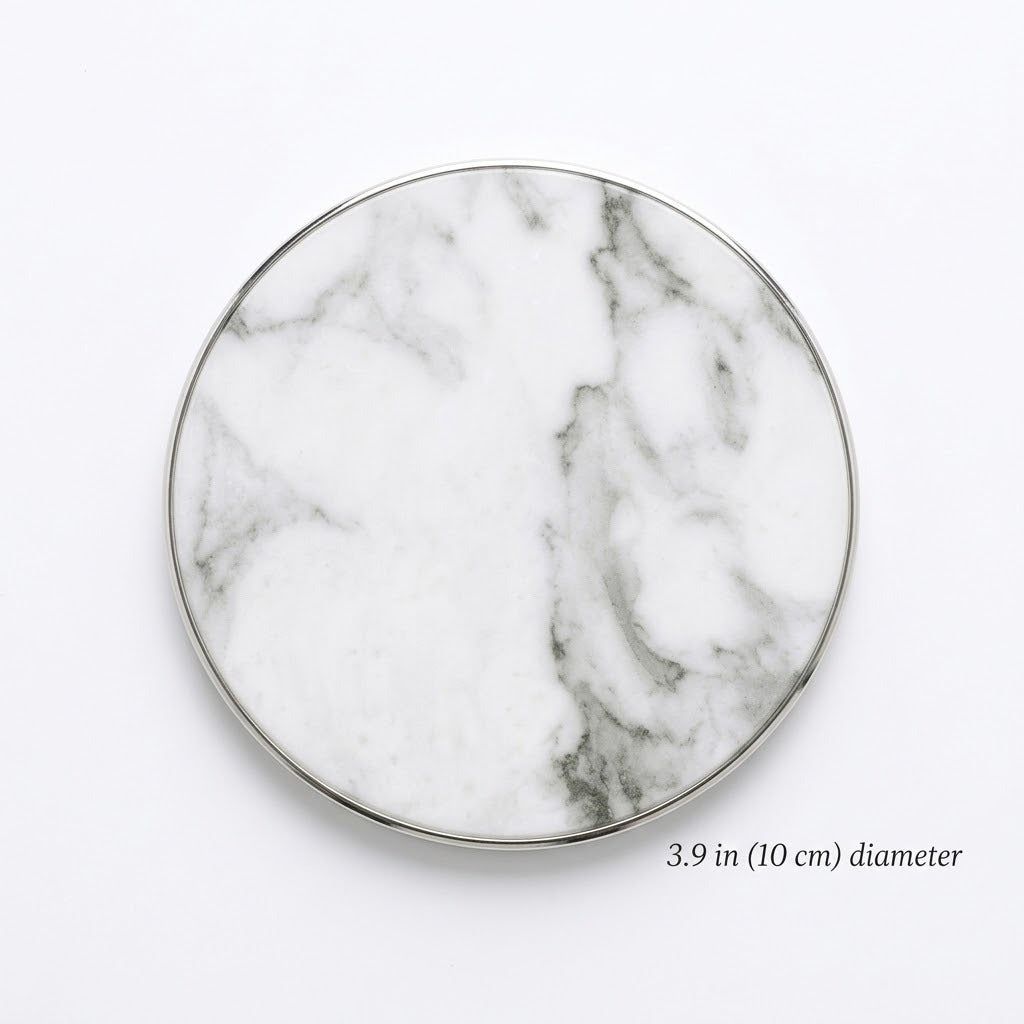 A round white marble-patterned coaster with a thin silver metallic rim, shown on a clean white background with a text overlay indicating its 3.9 in (10 cm) diameter.