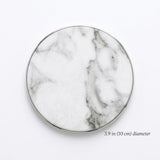 A round white marble-patterned coaster with a thin silver metallic rim, shown on a clean white background with a text overlay indicating its 3.9 in (10 cm) diameter.