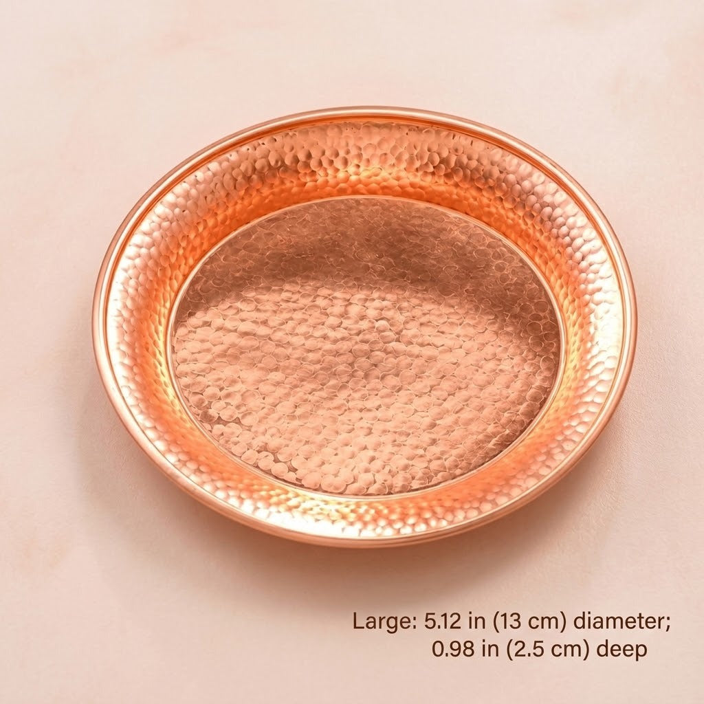 A round hammered copper tray with a textured, metallic finish, shown on a light beige background with text indicating its dimensions.
