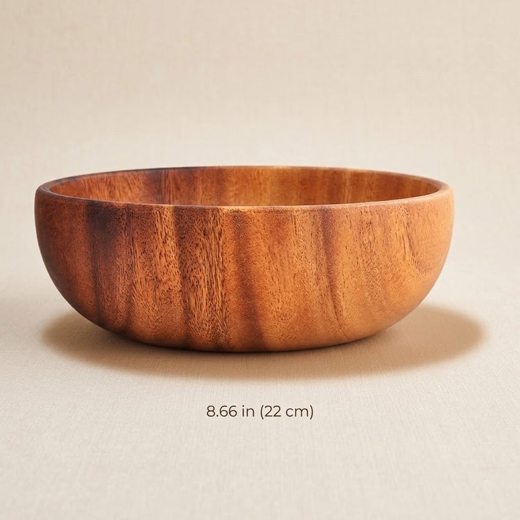 A round wooden bowl with a warm medium-brown finish and visible wood grain, shown on a light beige background with a shadow and the text '8.66 in (22 cm)' below it.
