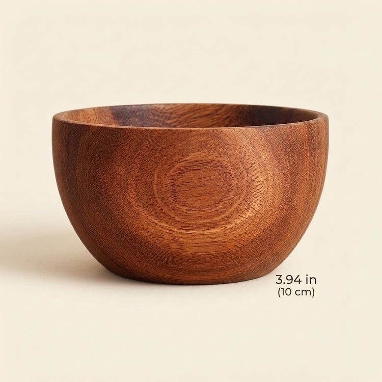 A round wooden bowl with a warm medium-brown finish and visible wood grain, shown on a light beige background with a small text overlay indicating its size as 3.94 in (10 cm).