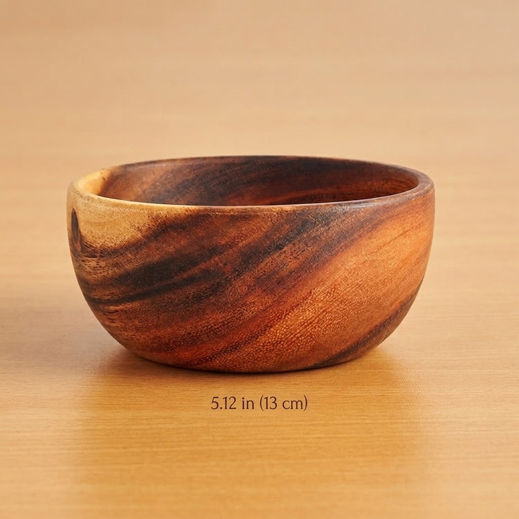A small round wooden bowl with a rich brown and black grain pattern, shown on a light wood surface with a size measurement overlay reading '5.12 in (13 cm)'.