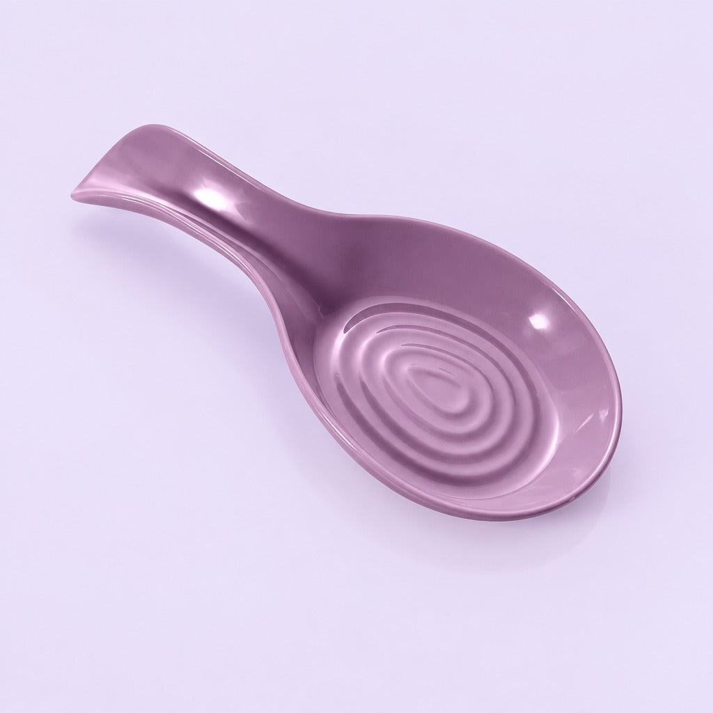 A glossy lavender ceramic spoon rest with a spiral pattern inside the bowl, shown on a light lavender background.