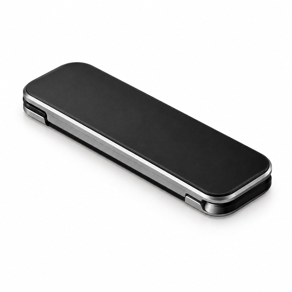 A slim black rectangular case with a matte finish and silver metallic trim, shown closed on a clean white background.