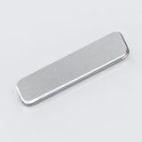 A silver rectangular metal case with rounded corners, shown at an angle on a light gray background.