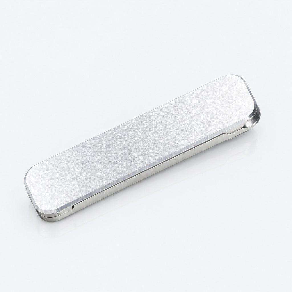 A slim, rectangular silver metal case with rounded corners, shown at an angle on a clean white background.