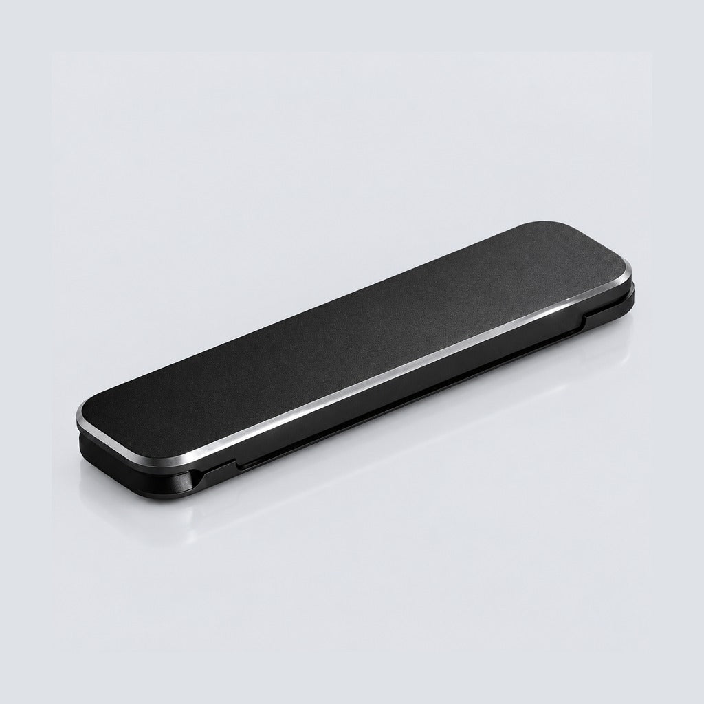 Black folding cot on a white background