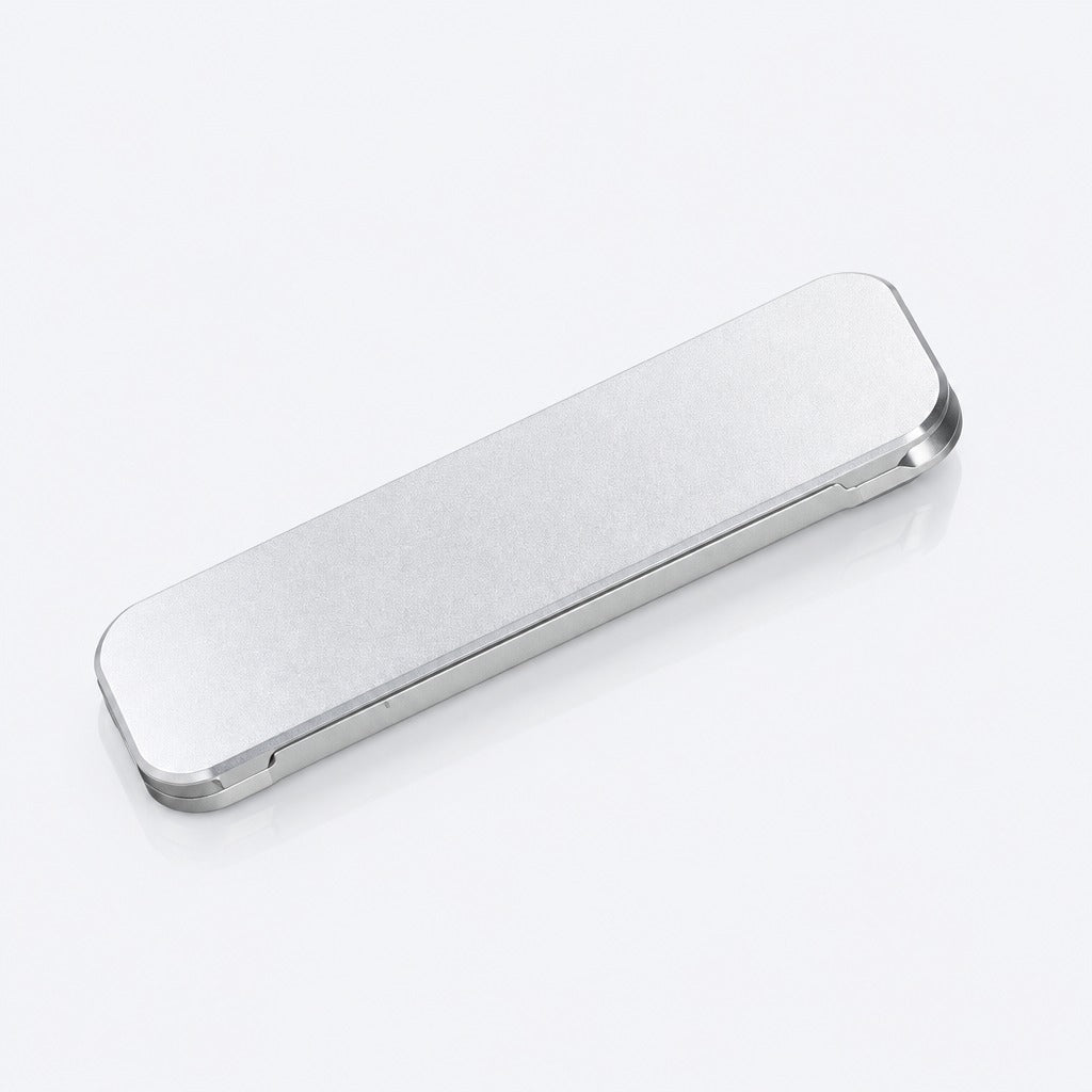 A silver metallic rectangular case with rounded corners, shown diagonally on a clean white background.