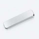 A silver metallic rectangular case with rounded corners, shown diagonally on a clean white background.