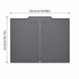 A dark gray rubber mat with diagonal grooved patterns, shown with dimension lines indicating a width of 50.5cm (19.