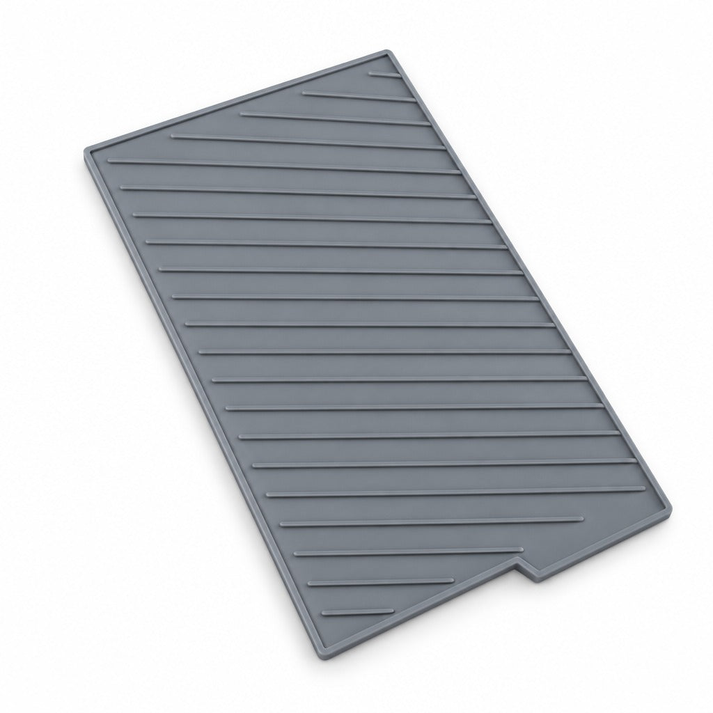 A dark gray rectangular silicone mat with diagonal ridges and a slotted design, shown on a plain white background.