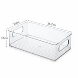Clear plastic storage bin with side handles, shown on a white background with dimension lines and measurements: 15 cm width, 25.7 cm length, and 7.