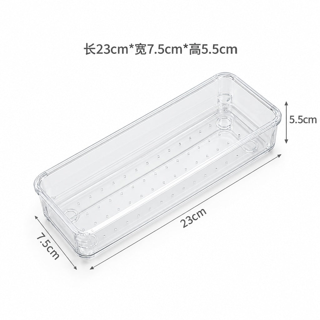 A clear plastic rectangular storage container with dimension labels showing 23cm length, 7.5cm width, and 5.