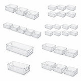 Multiple transparent plastic storage bins shown in different sizes and groupings on a plain white background.