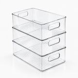 Three clear rectangular storage bins stacked vertically, with cutout handles and ribbed bases, against a white background.