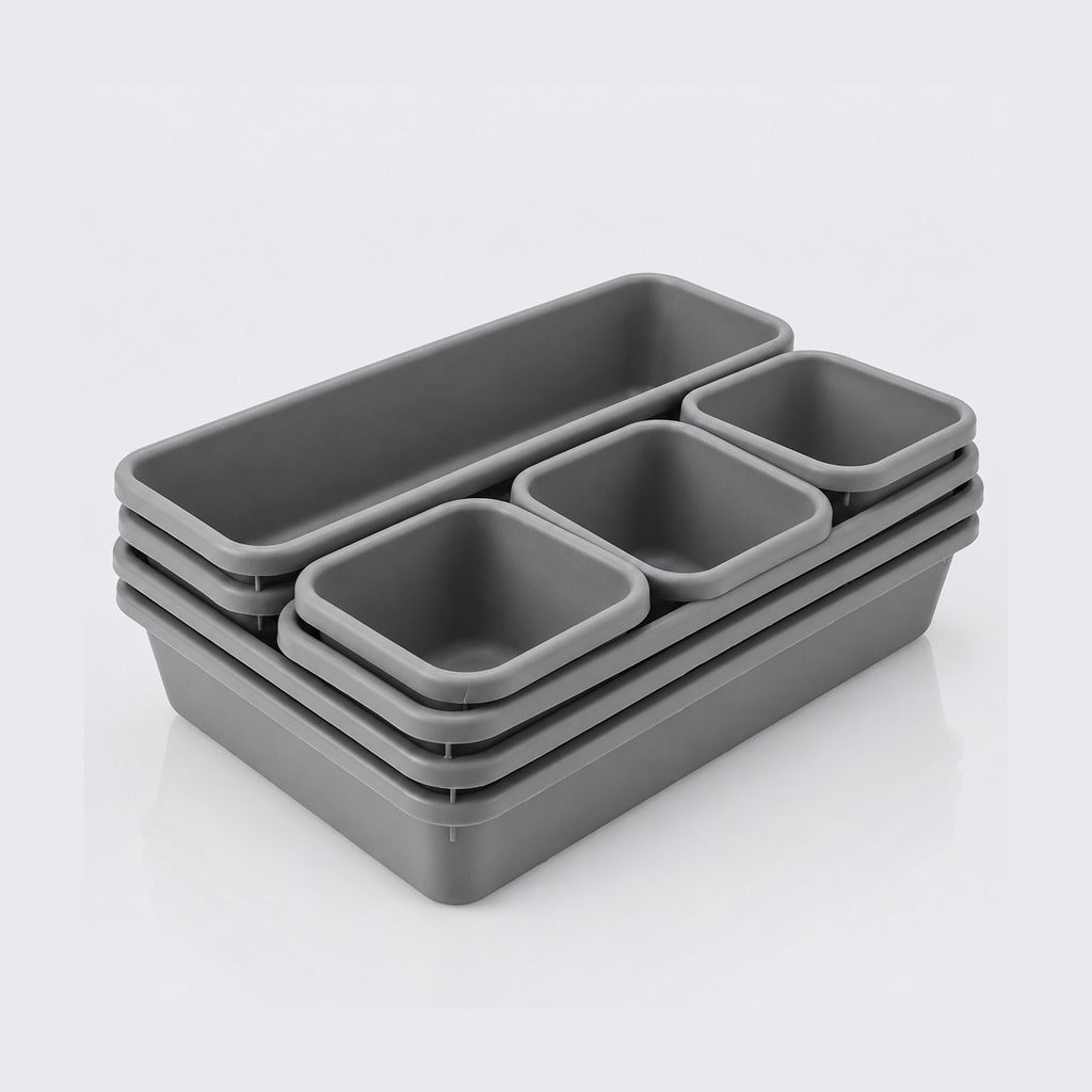 A set of five gray plastic storage containers in nested rectangular and square shapes, arranged on a clean white background.
