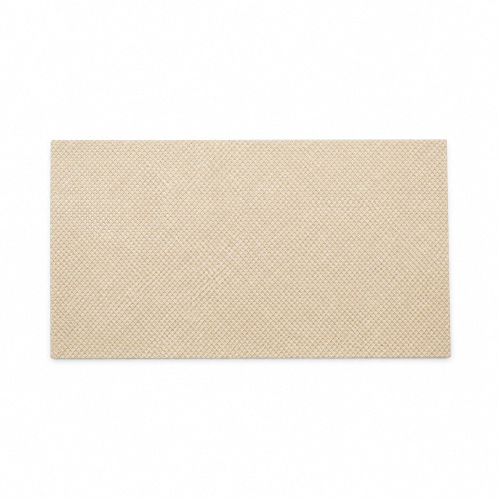 A rectangular beige placemat with a subtle woven texture, centered on a solid white background.