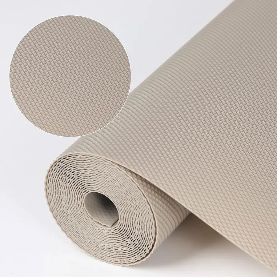 A roll of light beige woven fabric or mat material shown on a white background, with a circular inset close-up highlighting the textured surface.