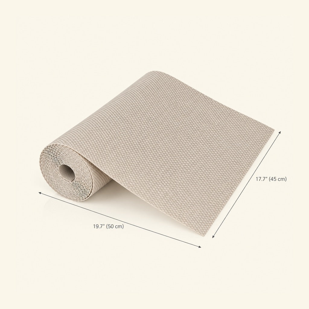 A rolled beige textured mat or sheet shown on a light cream background with dimension lines and labels indicating measurements of 19.7 inches (50 cm) by 17.