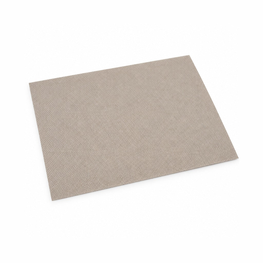 A rectangular woven placemat in a light taupe-beige color, shown at an angle on a clean white background.