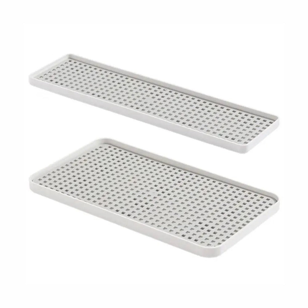 Two rectangular white plastic trays with perforated holes, shown on a plain white background.