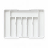 A white plastic multi-compartment organizer tray with five vertical slots, shown from a top-down view on a white background.