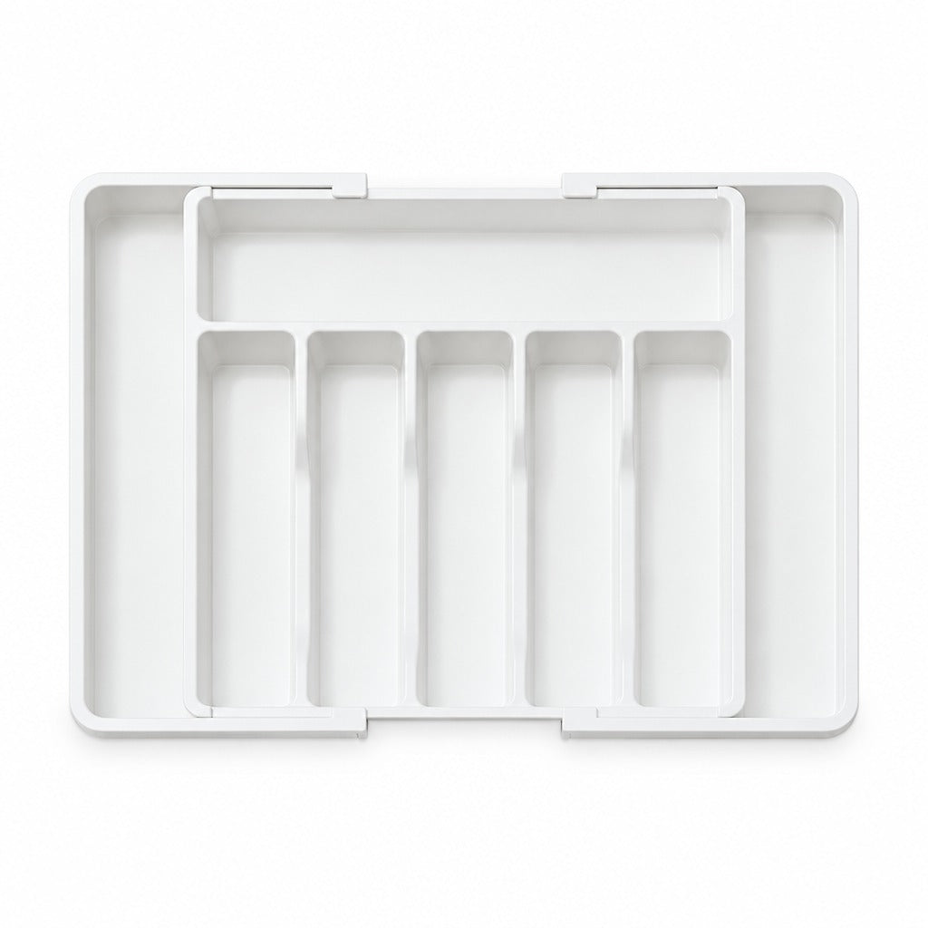 A white plastic multi-compartment organizer tray with five vertical slots, shown from a top-down view on a white background.