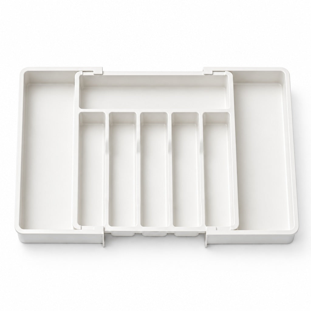 A white plastic organizer tray with multiple compartments, shown from a top-down view on a clean white background.