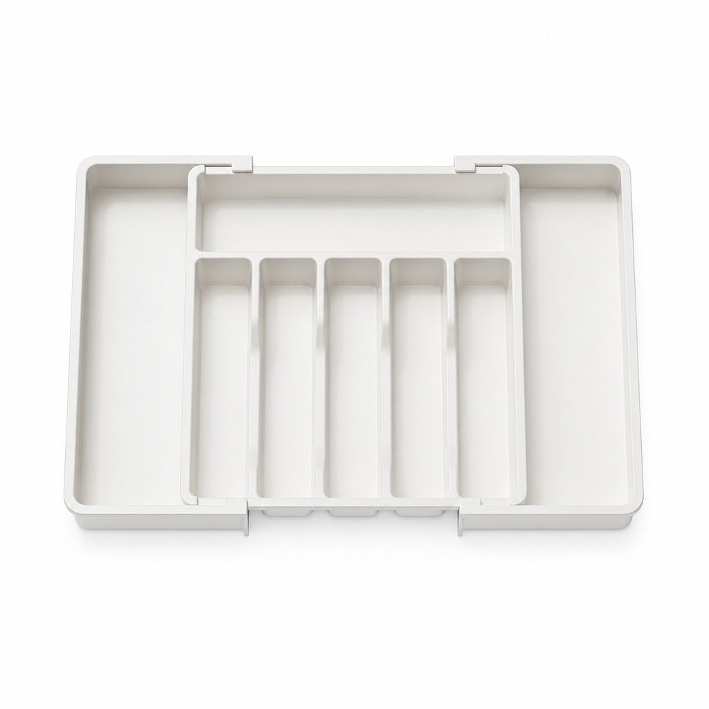 A white plastic organizer tray with multiple vertical compartments and a top divider, shown from a top-down view on a white background.
