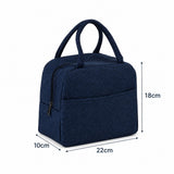 A dark navy blue fabric lunch bag with dual top handles, shown with dimension lines and labels indicating measurements of 18cm height, 10cm width, and 22cm depth on a white background.