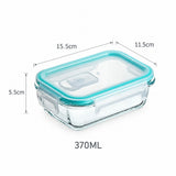 A clear glass rectangular storage container with a translucent aqua lid and measurement annotations showing 15.5cm, 11.
