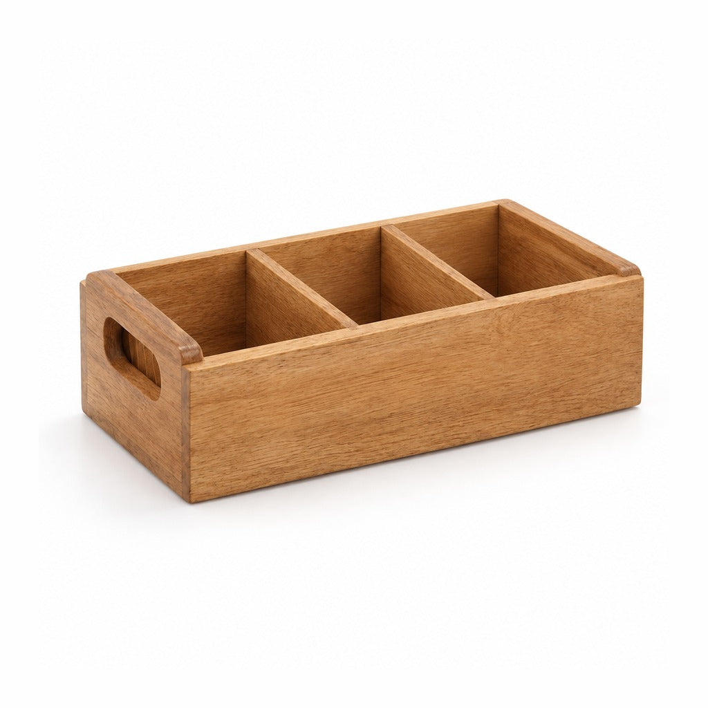 A wooden organizer tray holding multiple small beige tea bags or coffee bags, placed on a wooden table in a warm indoor setting with a plant and a cup nearby.