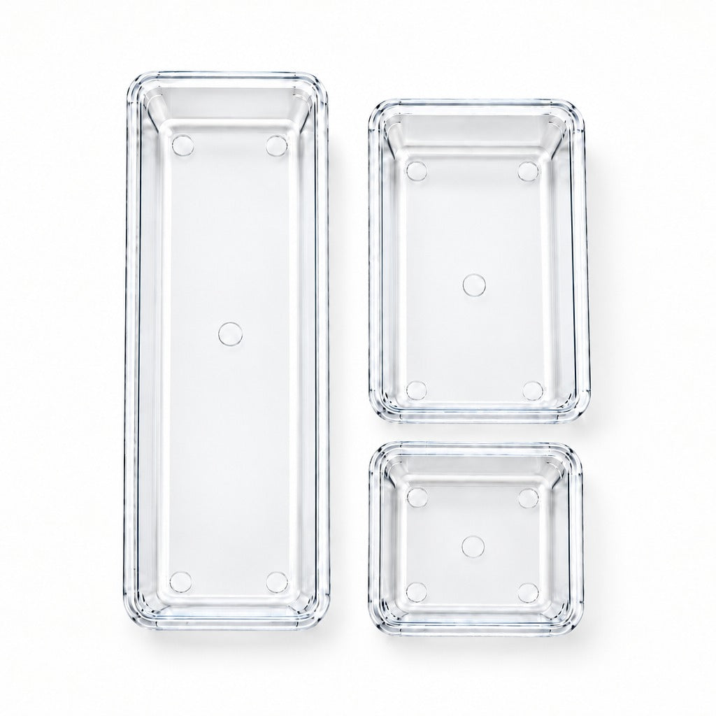 Three clear rectangular glass containers of different sizes arranged on a white background.