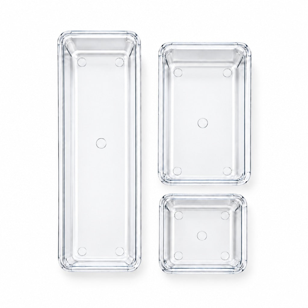 Three clear rectangular plastic storage containers in different sizes, arranged vertically on a plain white background.