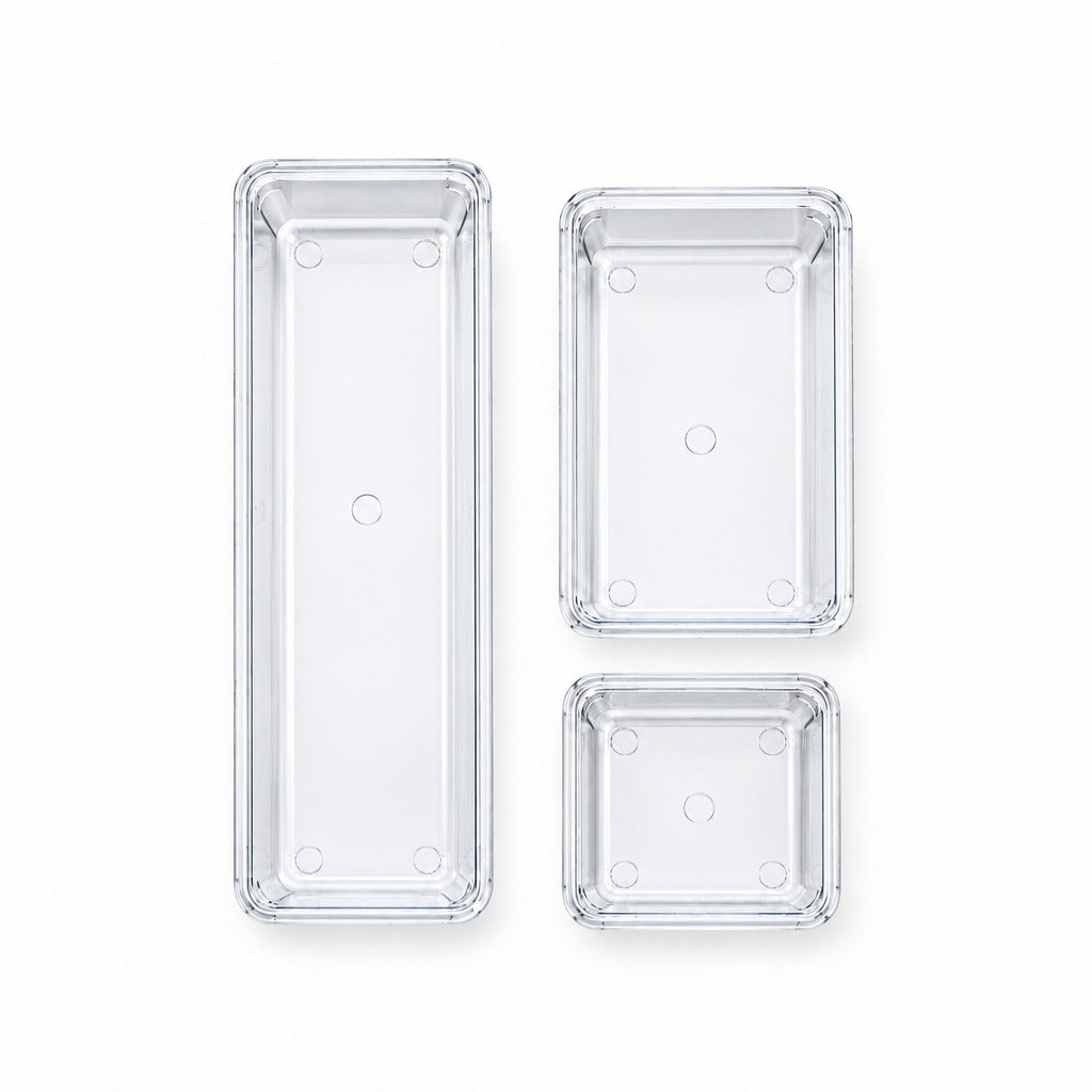 Three clear plastic rectangular storage containers in different sizes, arranged vertically on a plain white background.