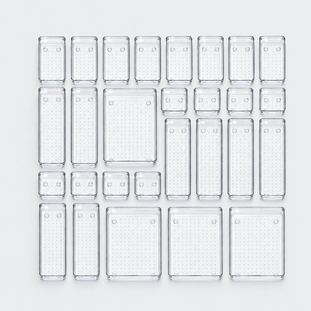 A set of clear plastic rectangular storage containers with a textured grid pattern, arranged in a neat grid on a light gray background.