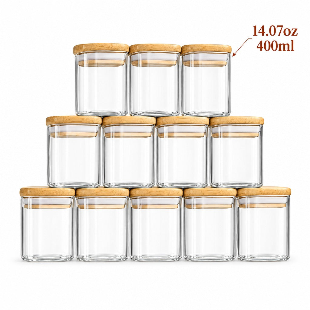 Twelve clear glass storage jars with light natural wood lids, arranged in a pyramid stack on a white background. A text overlay in the top right reads '14.