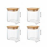 Four clear glass canisters with light brown bamboo lids, arranged in a 2x2 grid on a white background, each with dimension arrows and labels indicating 8cm height and 8cm width.