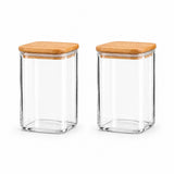 Two clear glass canisters with square bamboo lids, shown side by side on a white background.