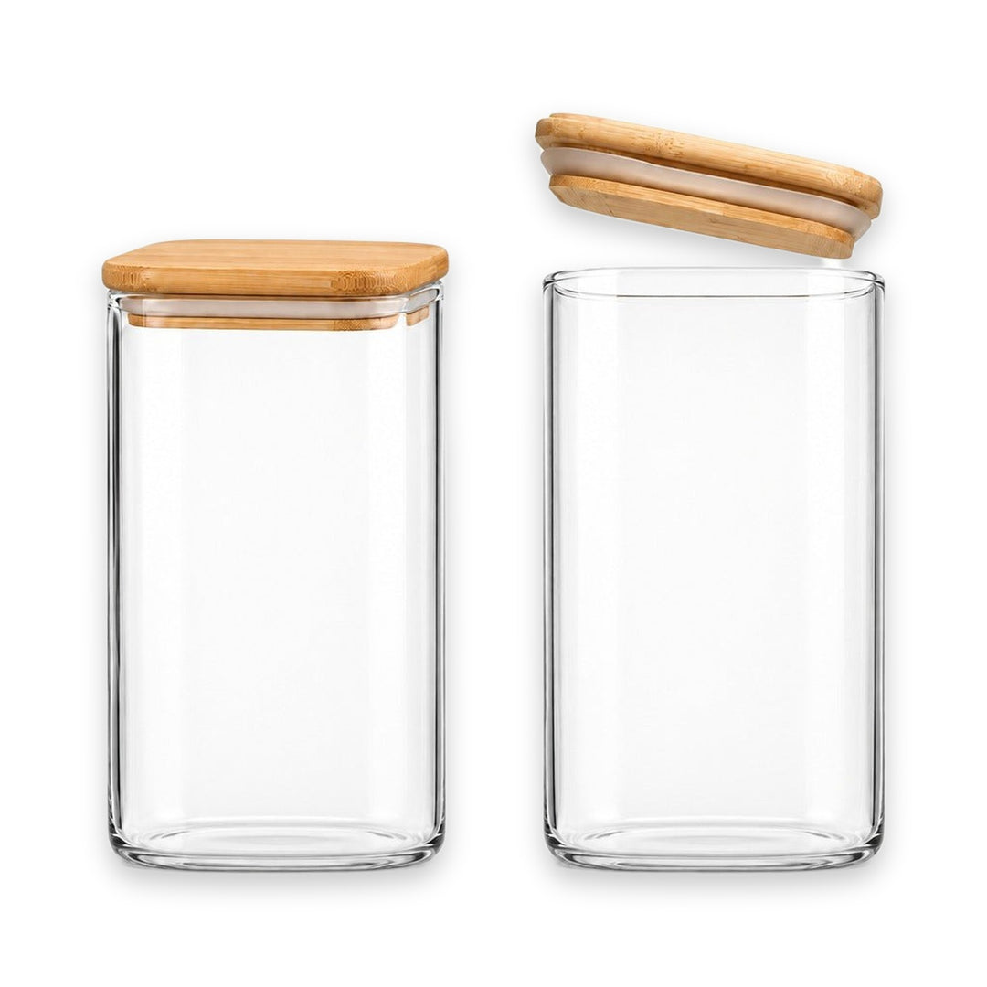 Two clear glass canisters with bamboo lids on a white background, one closed and one open to show the interior.