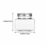 Clear glass jar with a silver metal screw-on lid, shown with dimension labels indicating a height of 4.33 inches (11 cm) and a width of 2.