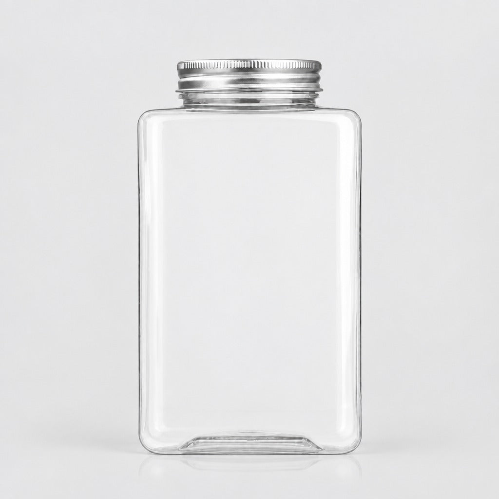 A clear rectangular glass jar with rounded corners and a silver metal screw-on lid, shown on a light gray background.