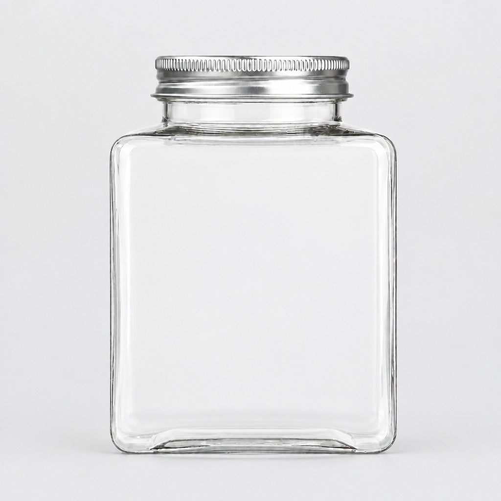 A clear square glass jar with a ribbed silver metal screw-on lid, shown against a plain light gray background.