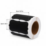 A roll of black and white cow-print stickers on a white background with dimension lines indicating 5cm width and 3cm height.