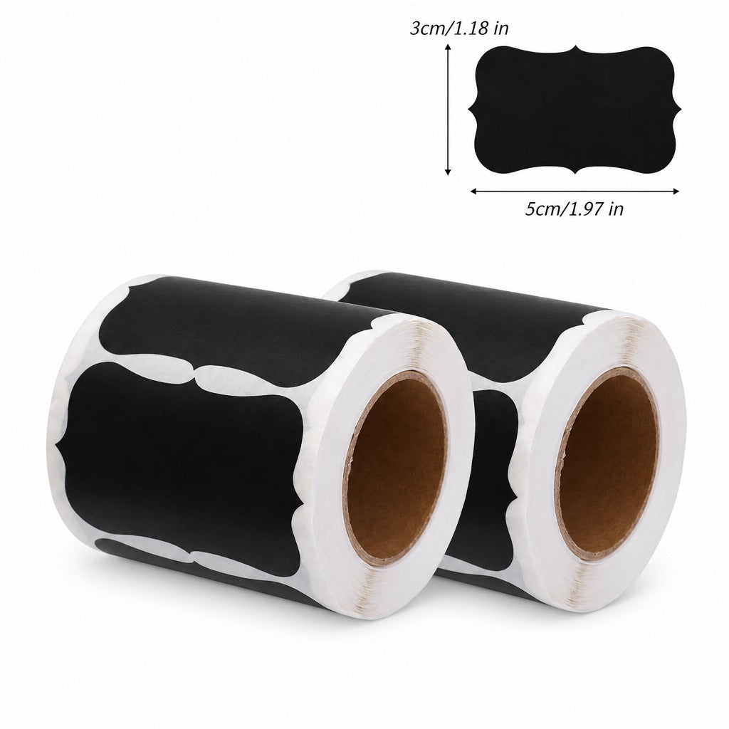 Two rolls of black decorative chalkboard labels with white scalloped edges, shown on a white background with a size diagram indicating 3cm by 5cm.